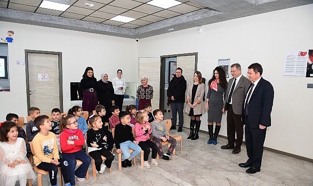 cocuklarin karnelerini baskan erkan aydin verdi